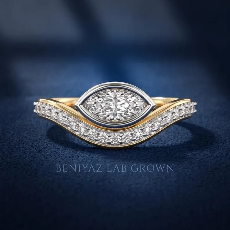 Marquise engagement ring with an east west lab grown diamond in gold