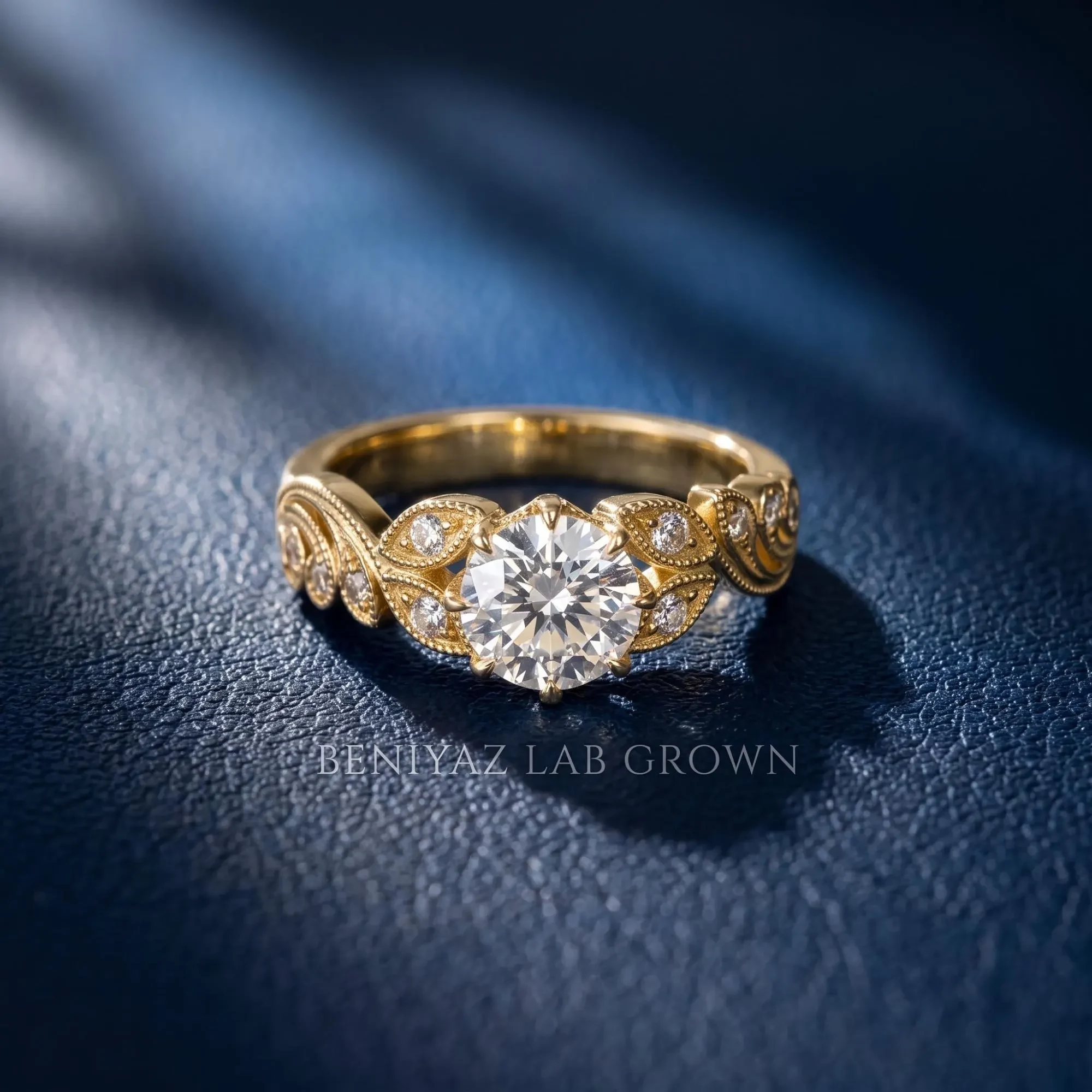 1.5 CT round lab grown diamond vintage filigree engagement ring with leaf motifs, milgrain detailing and diamond accents on deep navy fabric.